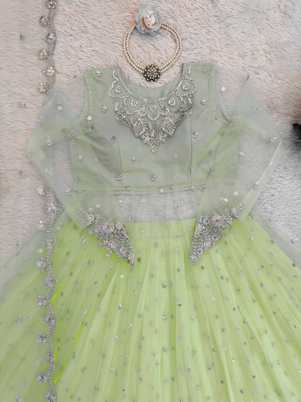 Pista Green Faux Georgette Thread and Sequence Work Gown with Lehenga and Butterfly Net Dupatta
