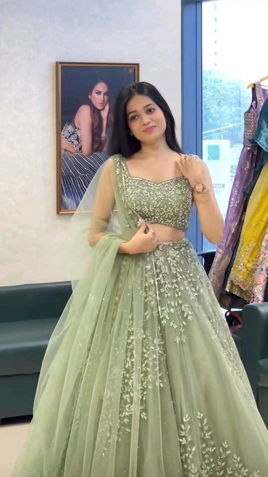 Soft Net Pista Green Color Lehenga Choli Set