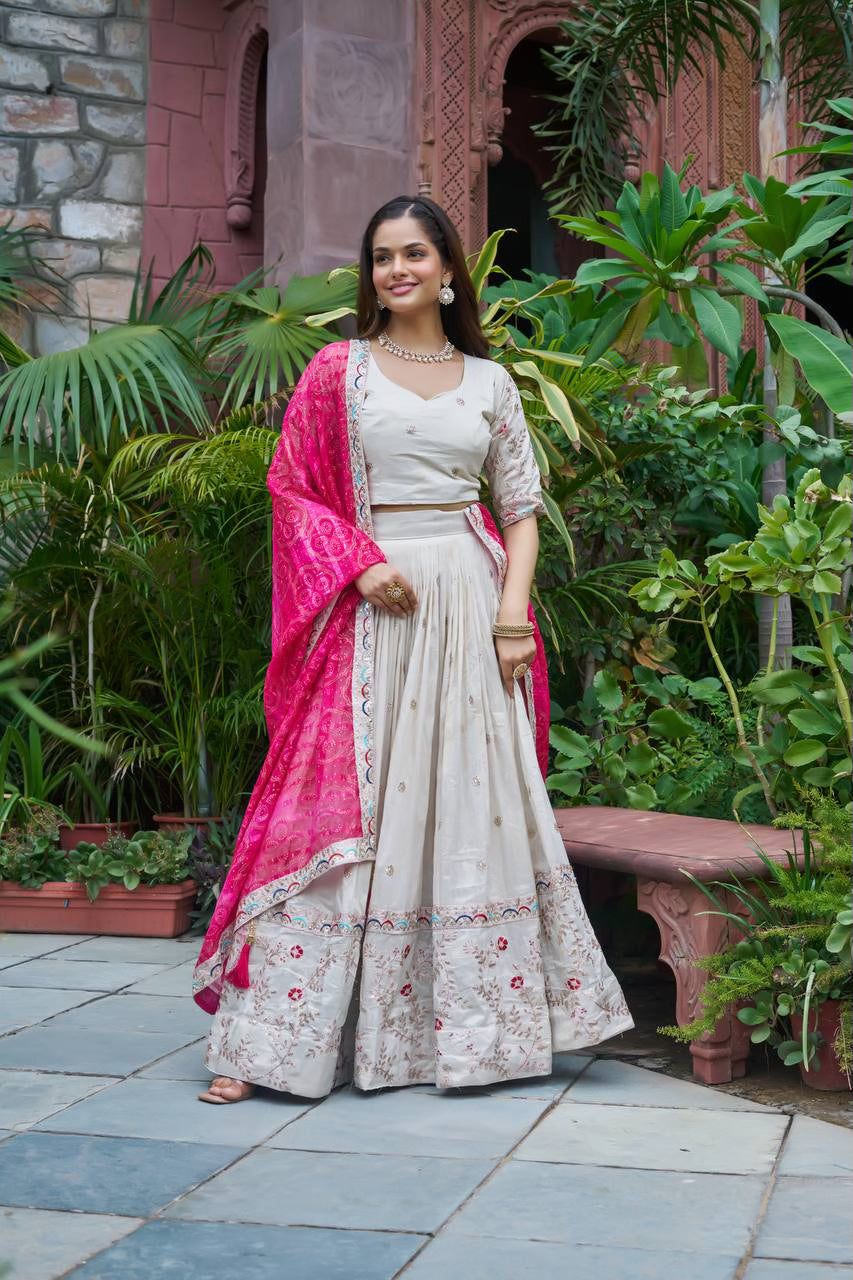 Heavy Embroidered Ivory Tissue Silk Lehenga with Pink Dupatta
