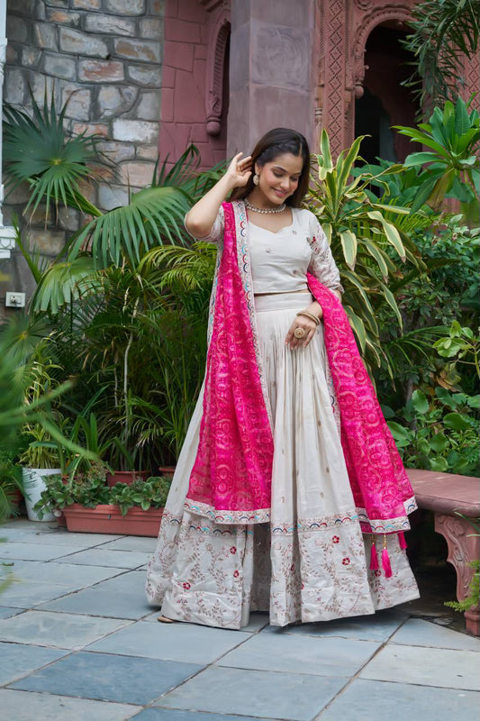 Heavy Embroidered Ivory Tissue Silk Lehenga with Pink Dupatta