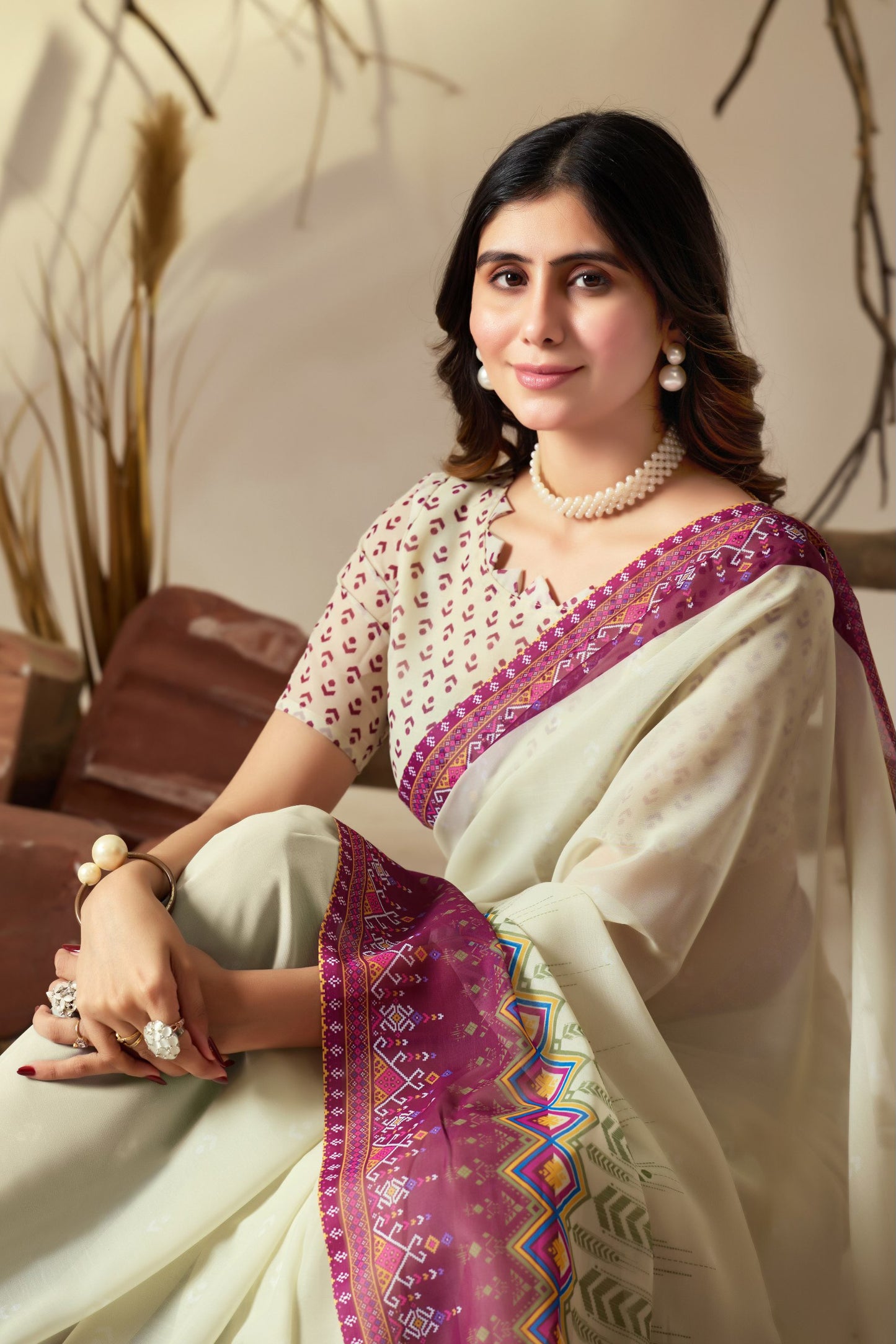 Soft Georgette Saree With Artistic Cream Body and Tassel Detailing