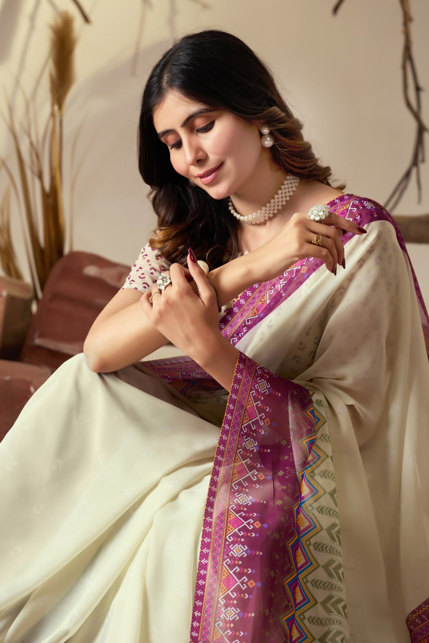 Soft Georgette Saree With Artistic Cream Body and Tassel Detailing