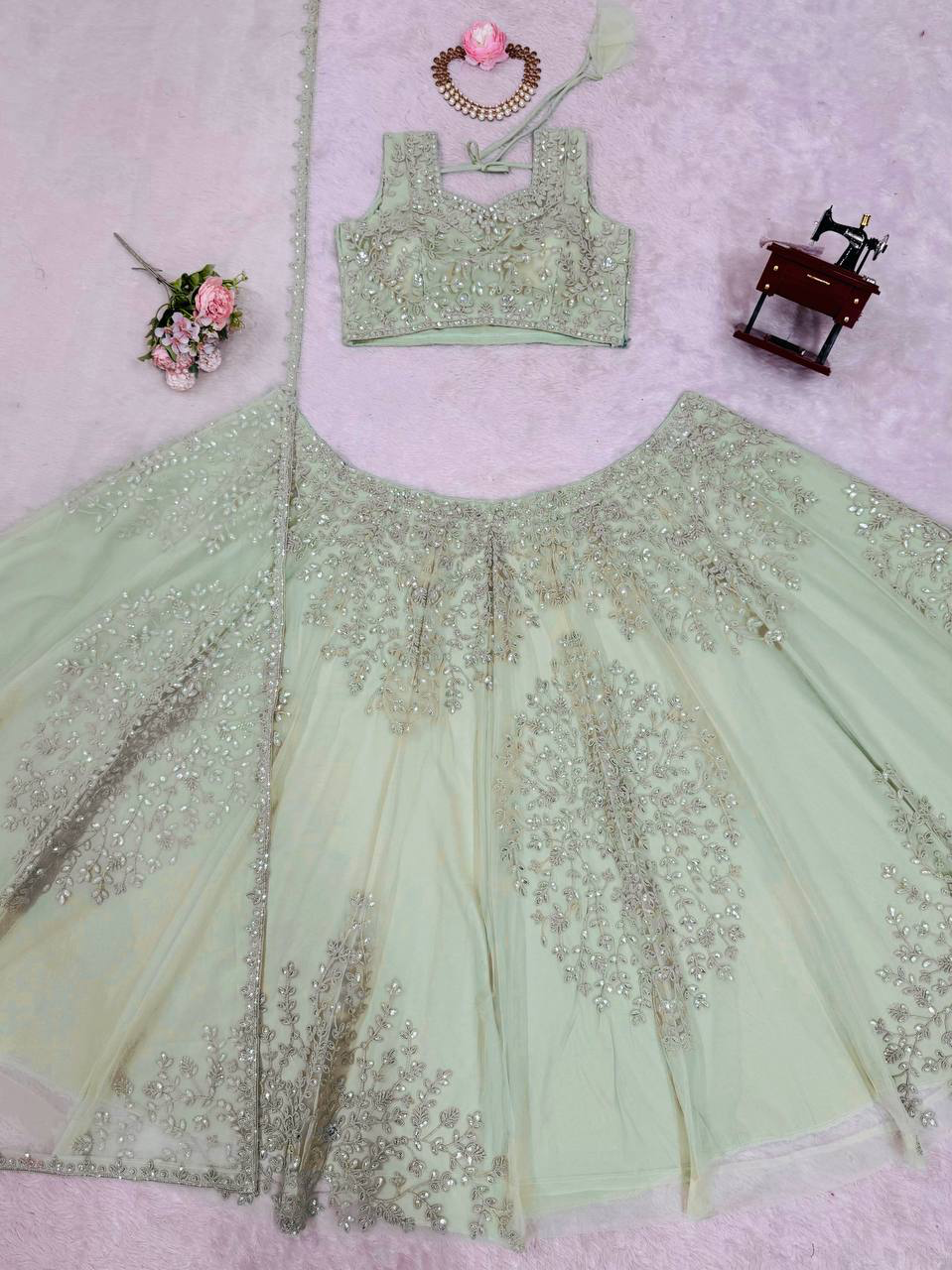 Soft net pista green colour lehenga choli set