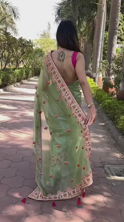 Multi Thread Work Pista Green Net Saree With Pink Blouse