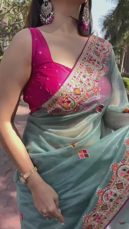 Pink Blouse With Thread Embroidered Sky Blue Net Saree