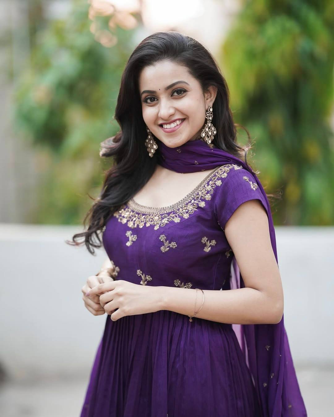 Purple georgette sequins zari & thread embroidery work gown attached dupatta & belt