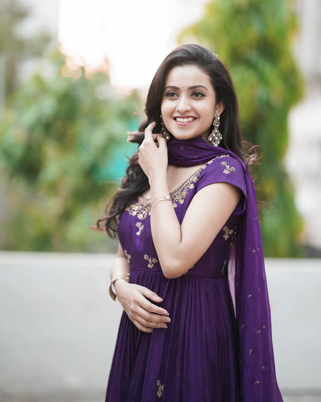 Purple georgette sequins zari & thread embroidery work gown attached dupatta & belt