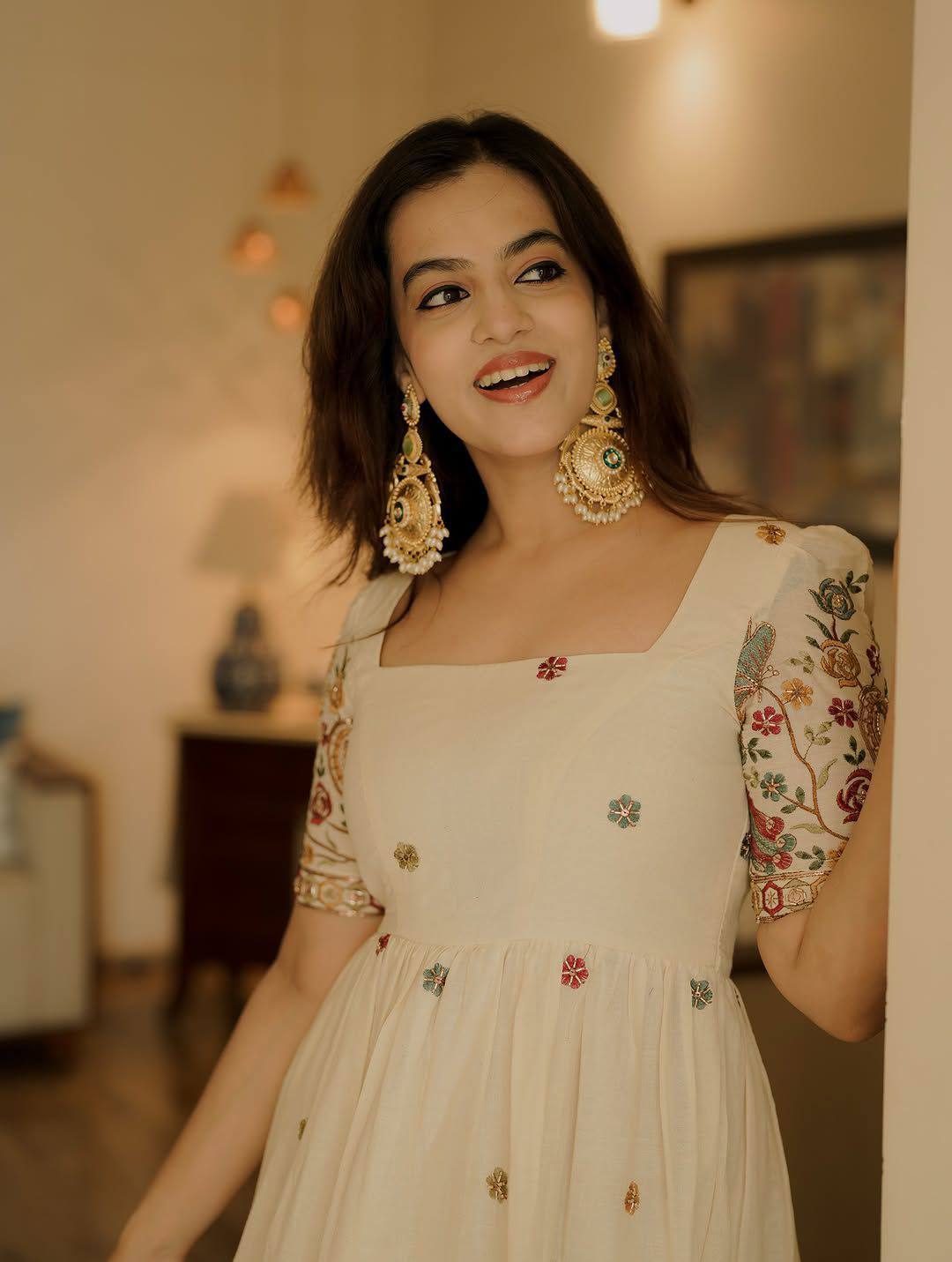 Ivory roman silk embroidery work anarkali gown