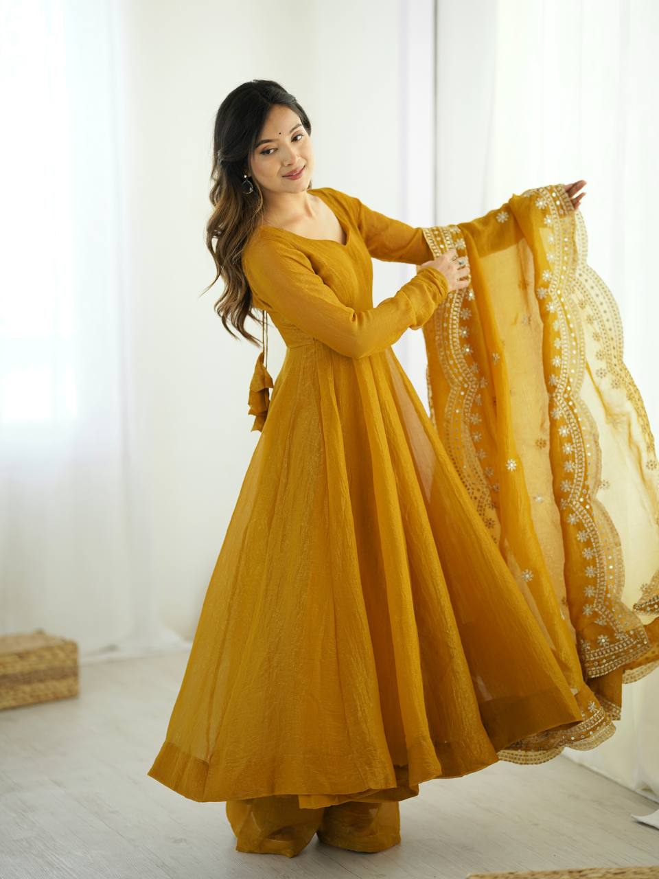 Yellow fandy silk with full sleeves gown-dupatta in heavy embroidery sequence Work