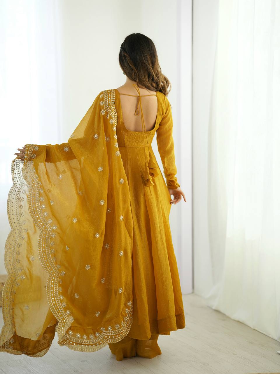 Yellow fandy silk with full sleeves gown-dupatta in heavy embroidery sequence Work