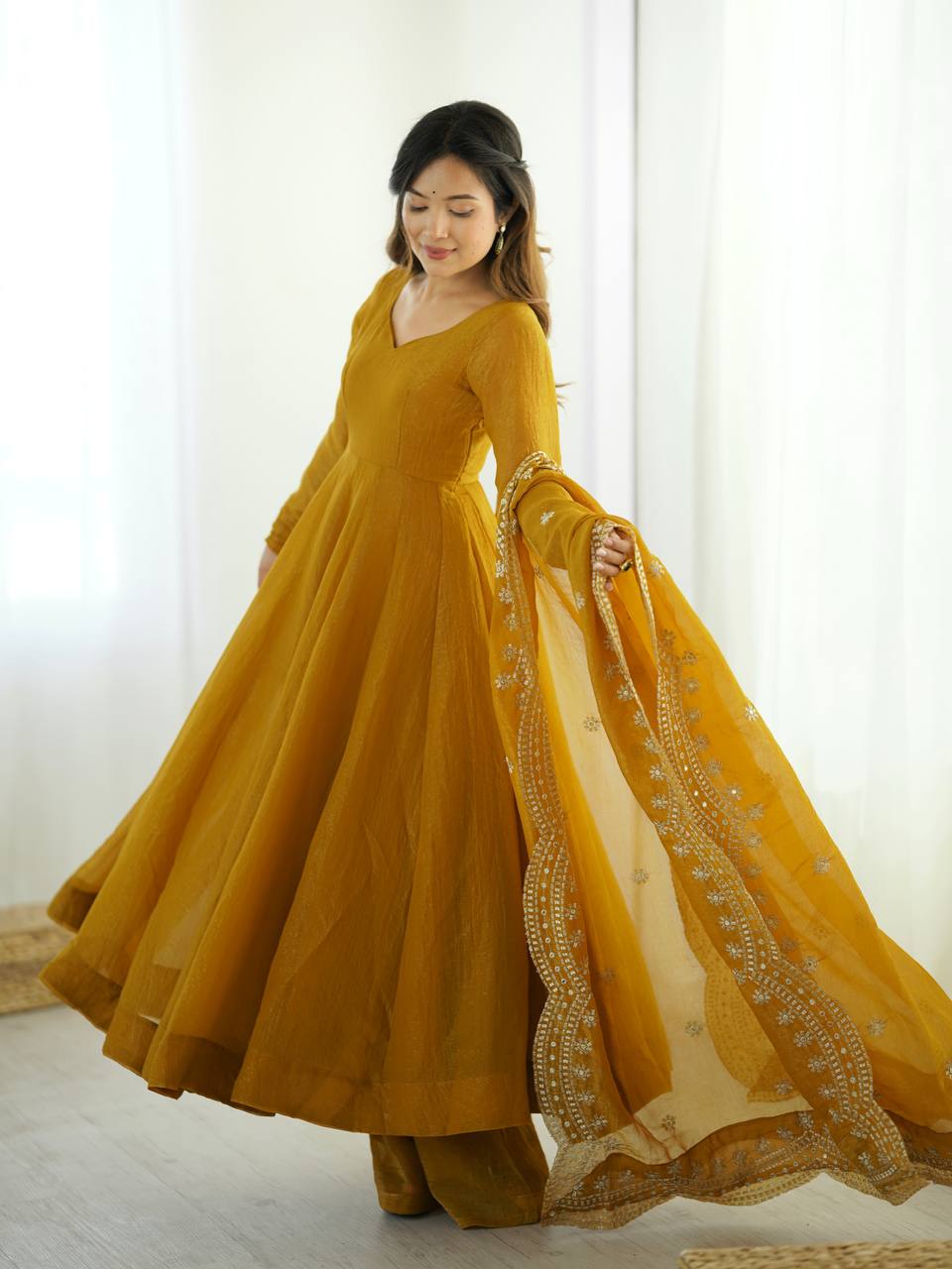 Yellow fandy silk with full sleeves gown-dupatta in heavy embroidery sequence Work