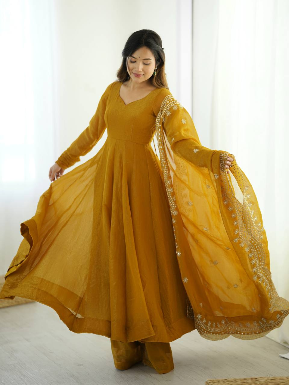Yellow fandy silk with full sleeves gown-dupatta in heavy embroidery sequence Work