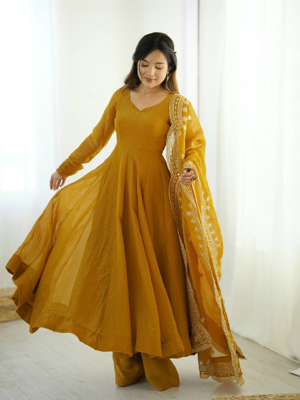 Yellow fandy silk with full sleeves gown-dupatta in heavy embroidery sequence Work