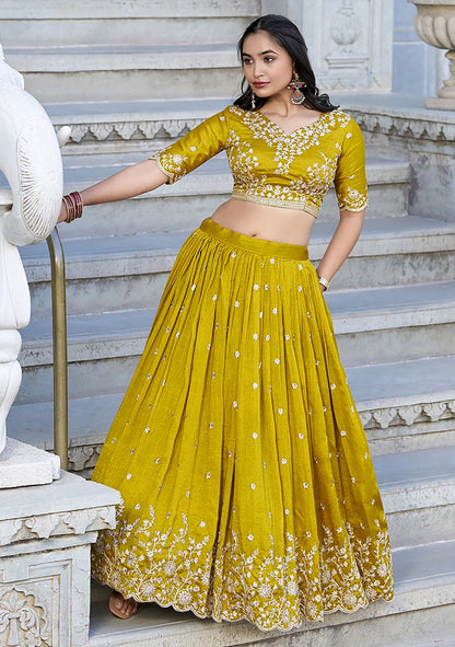 Yellow chinon embroidered zari work lehenga choli