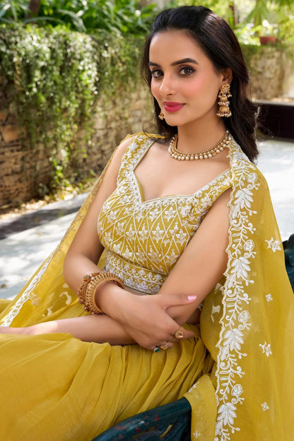 Yellow chinon embroidered zari work lehenga choli