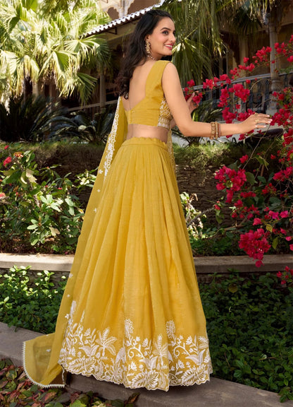 Yellow chinon embroidered zari work lehenga choli