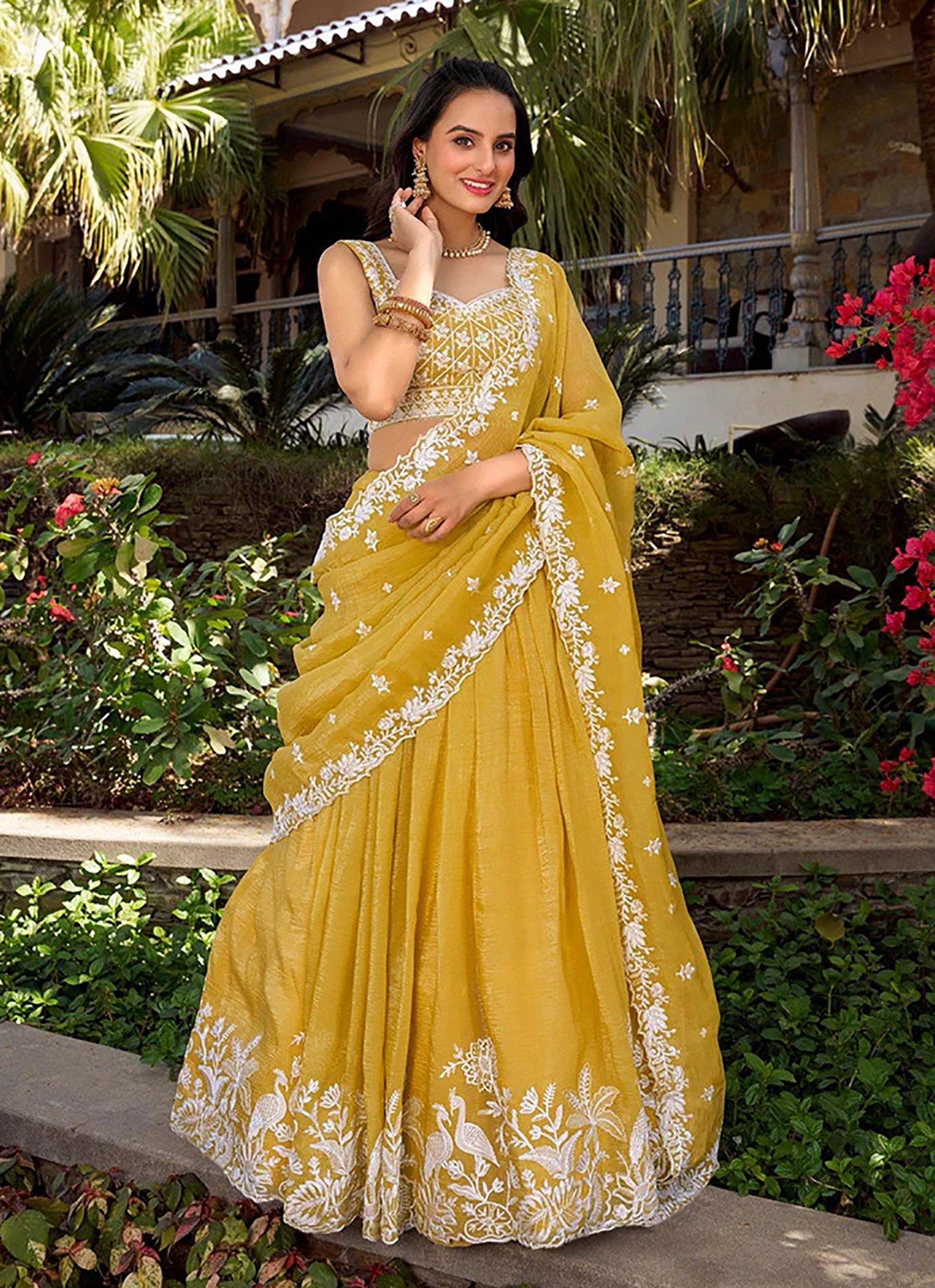 Yellow chinon embroidered zari work lehenga choli