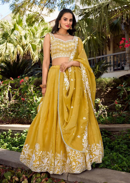 Yellow chinon embroidered zari work lehenga choli
