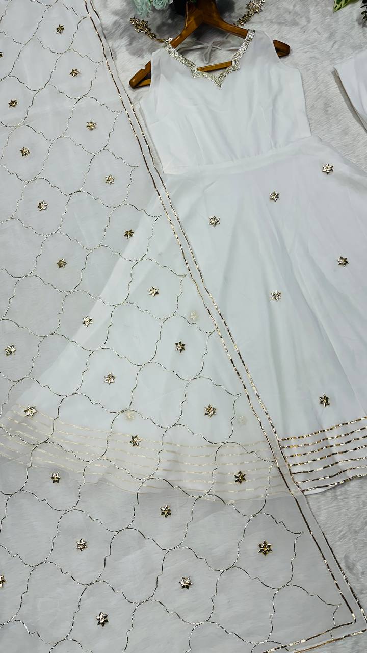 White faux georgette with embroidery work anarkali set