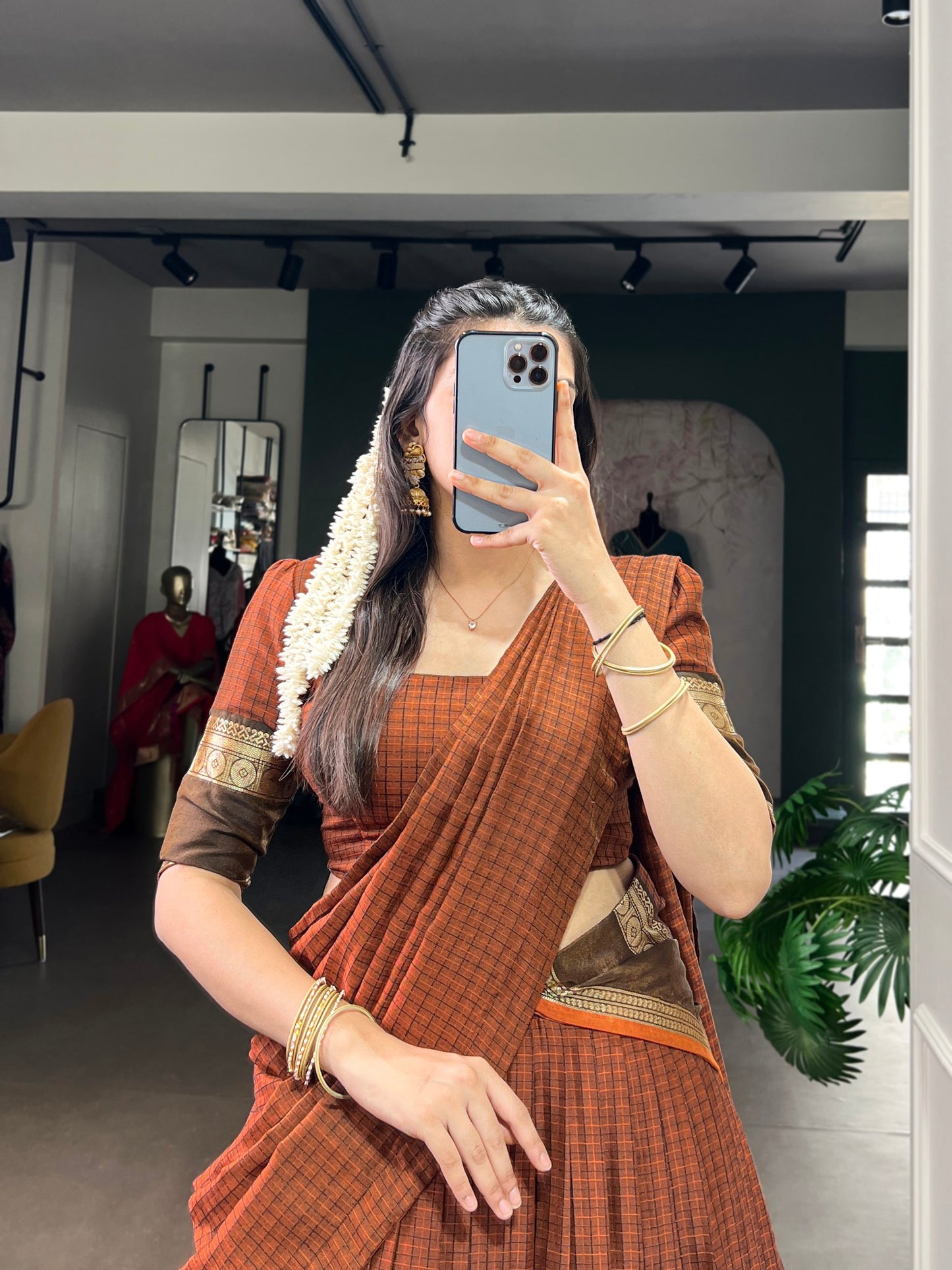 Orange chettinad cotton chex with zari weaving work lehenga choli