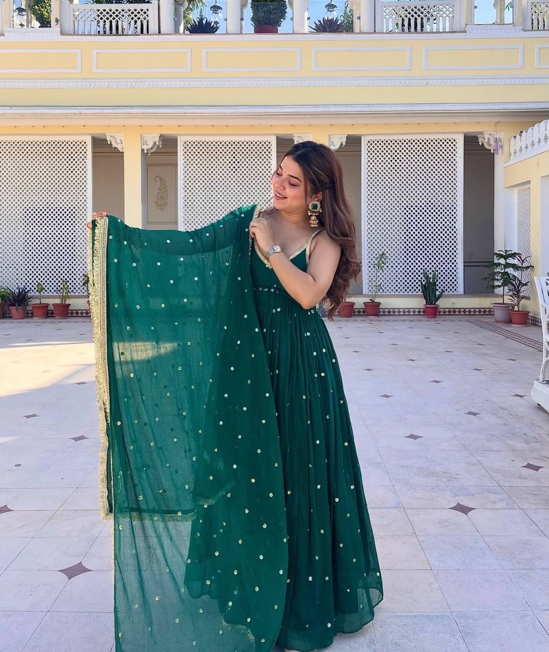 Dark green faux blooming with heavy sequins & zari work anarkali set