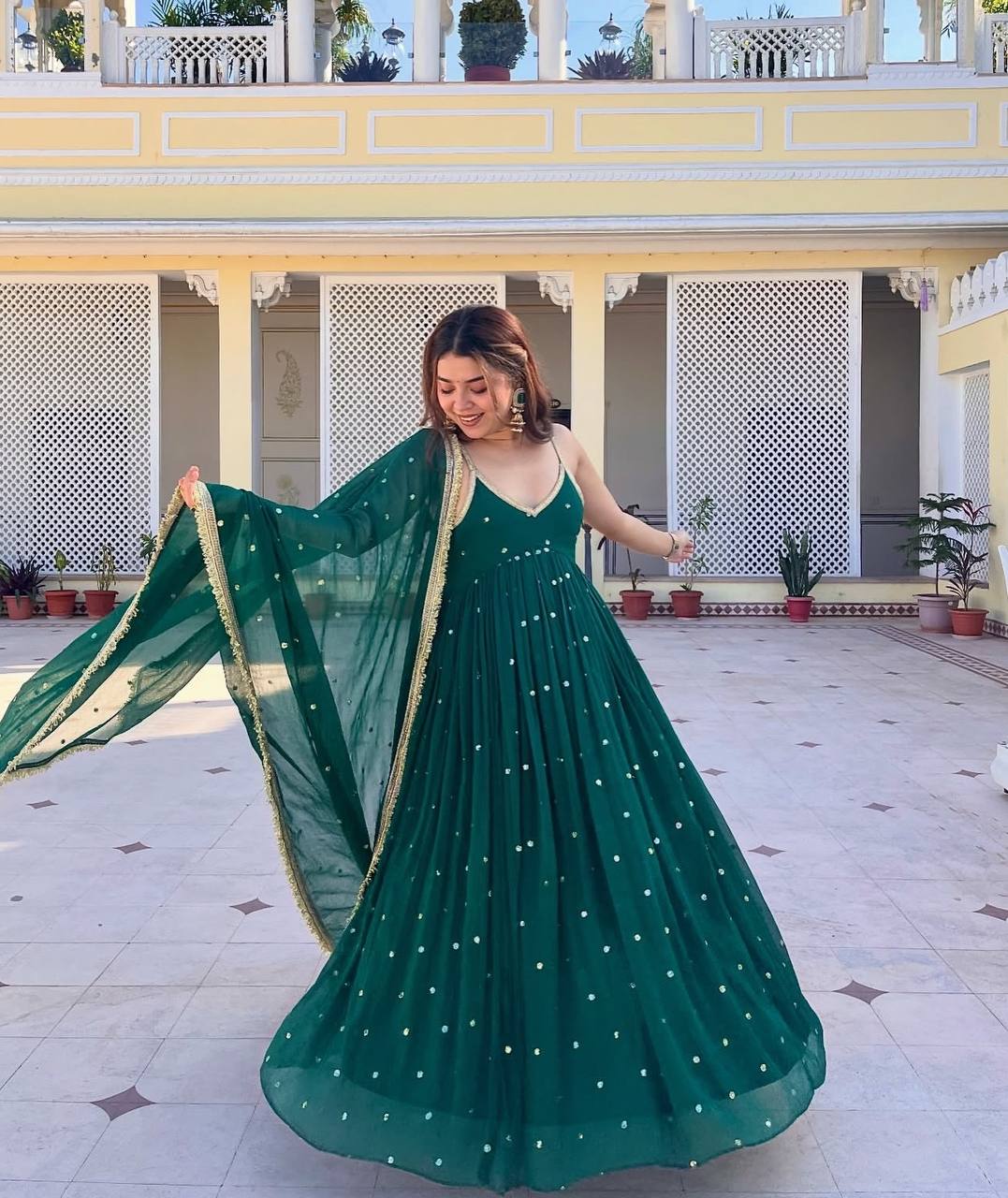 Dark green faux blooming with heavy sequins & zari work anarkali set