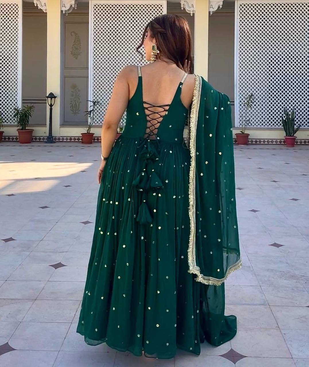 Dark green faux blooming with heavy sequins & zari work anarkali set