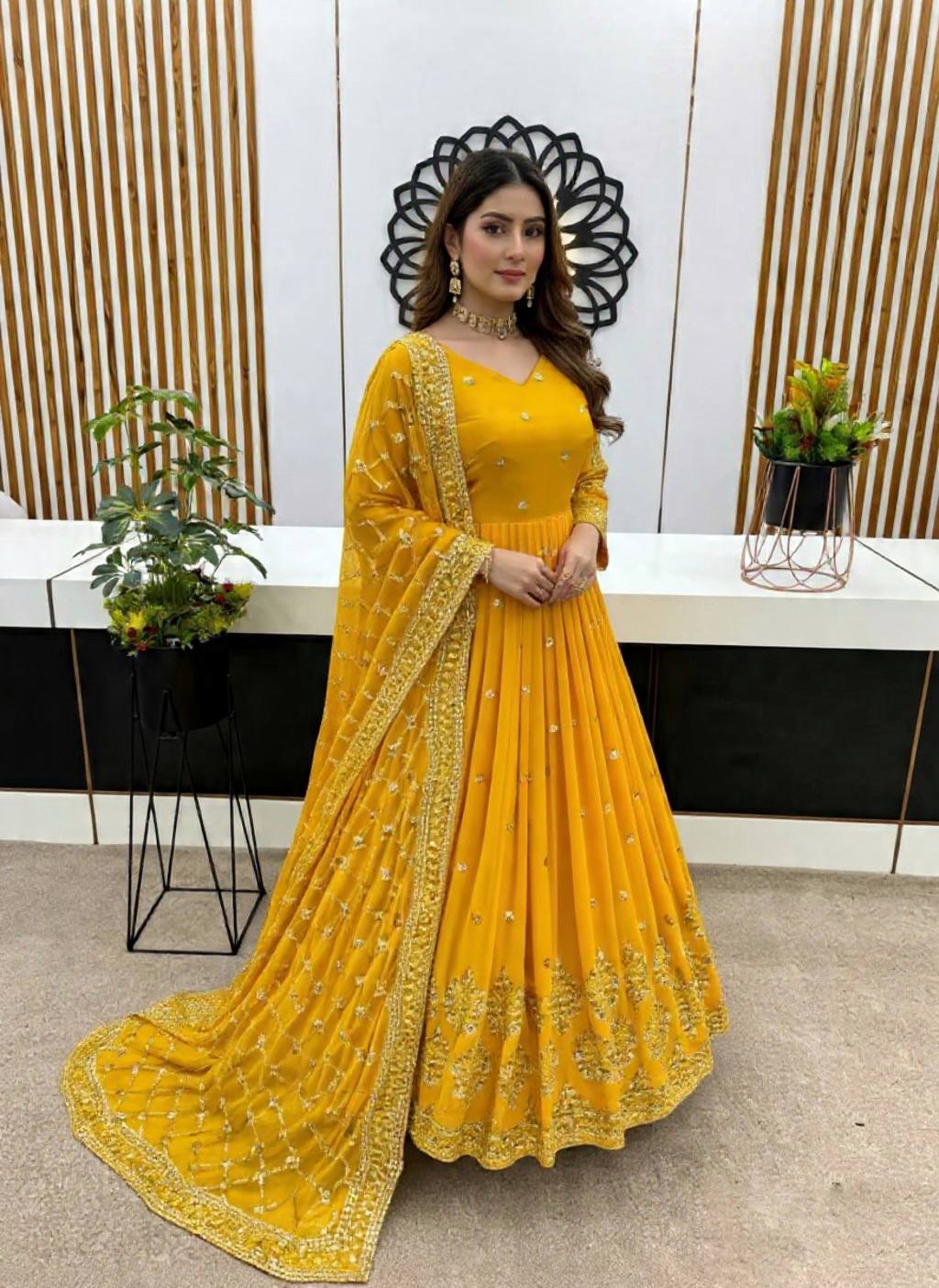 Yellow faux georgette embroidery sequence work gown and dupatta