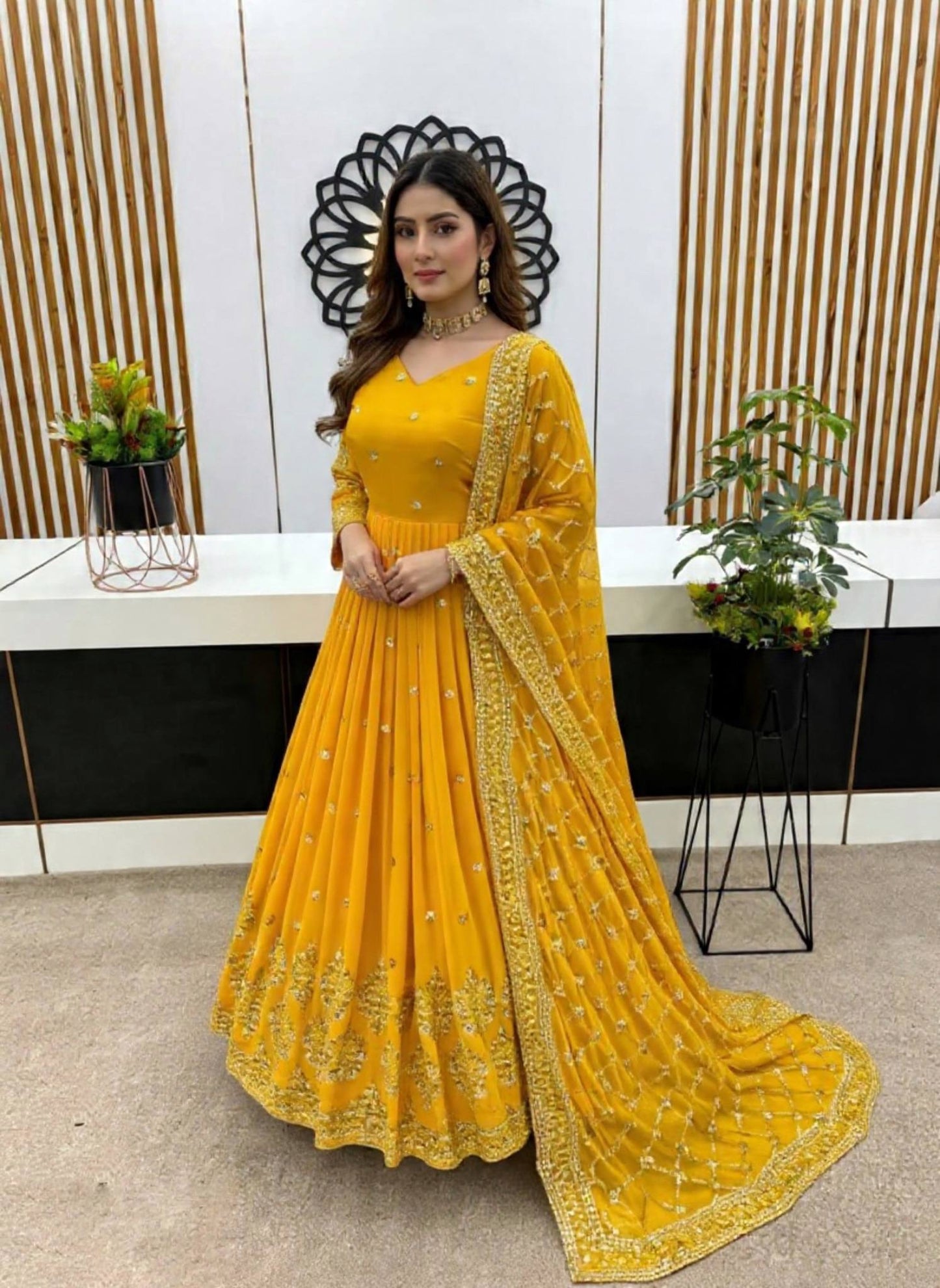 Yellow faux georgette embroidery sequence work gown and dupatta