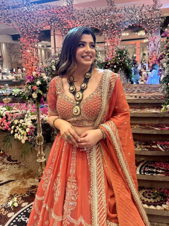Orange foux georgette thread with  Sequence work lehenga choli
