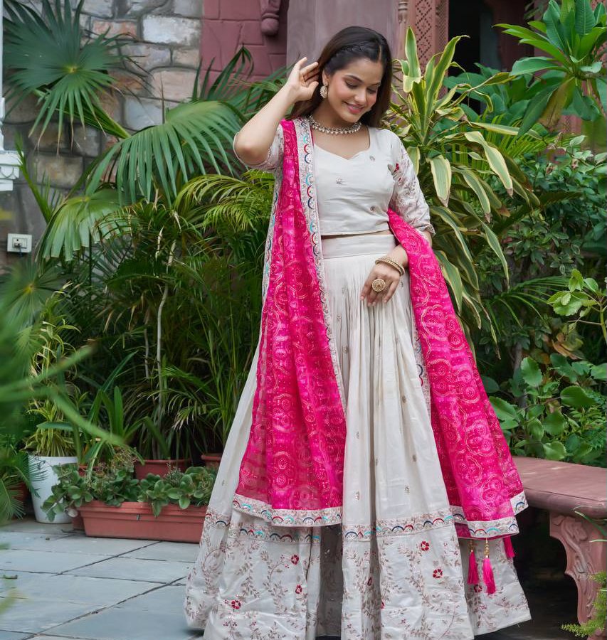 Heavy Embroidered Ivory Tissue Silk Lehenga with Pink Dupatta