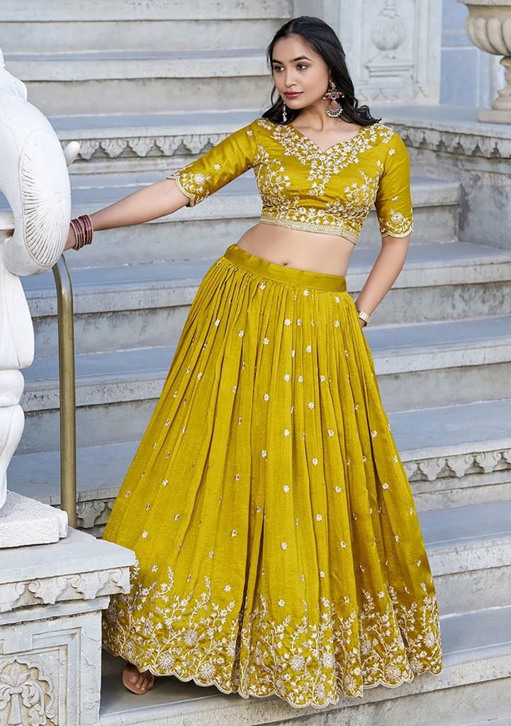Yellow chinon embroidered zari work lehenga choli
