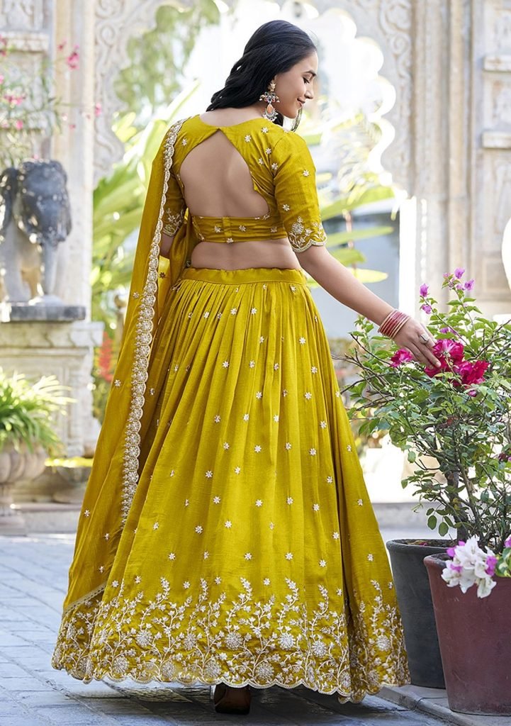 Yellow chinon embroidered zari work lehenga choli
