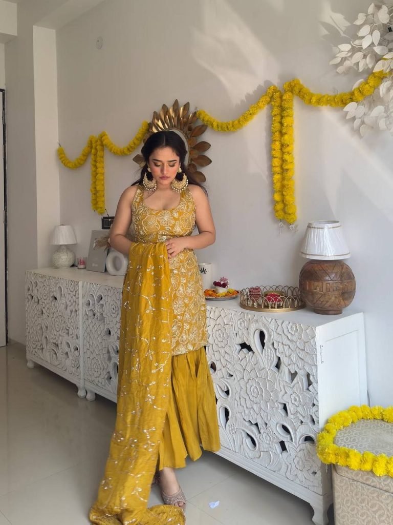 Yellow simmer silk thread with sequence top, sharara and dupatta set