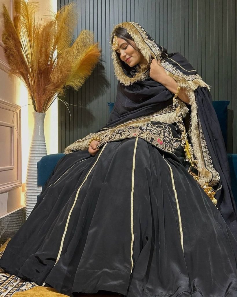 Black crep silk with thread sequence top sharara and dupatta set