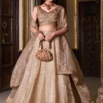 Golden Color Silk Lehenga With Zari Embroidered Work Blouse