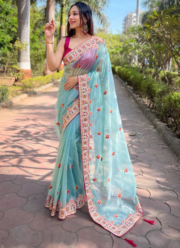 Pink Blouse With Thread Embroidered Sky Blue Net Saree