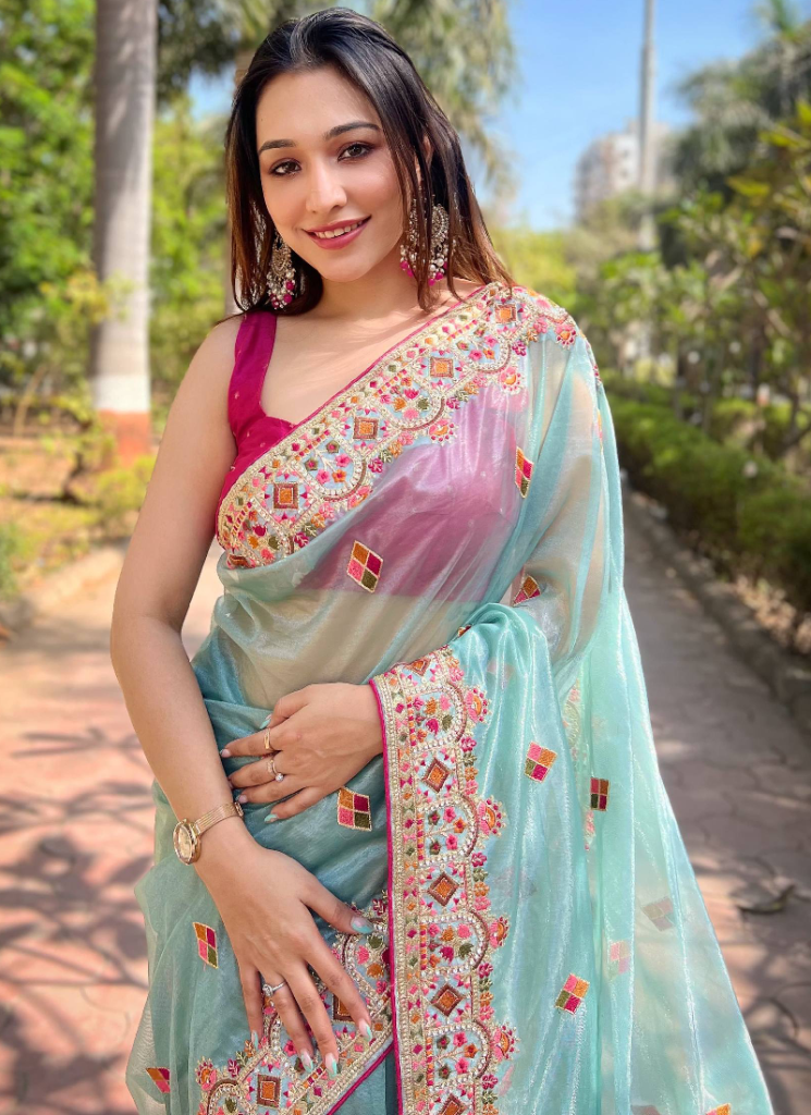 Pink Blouse With Thread Embroidered Sky Blue Net Saree