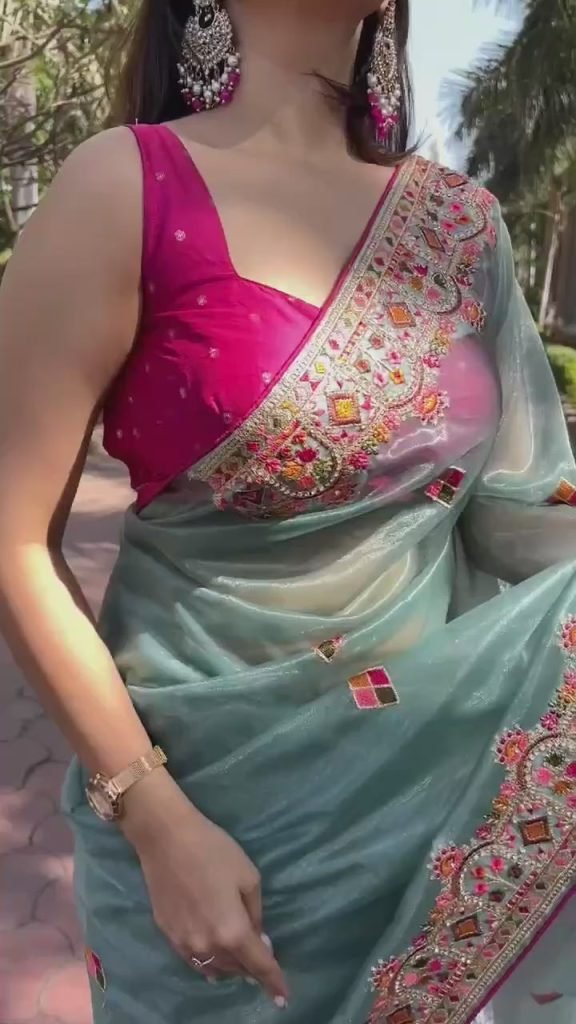 Pink Blouse With Thread Embroidered Sky Blue Net Saree