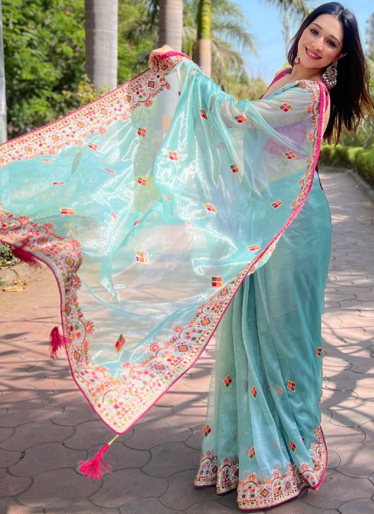 Pink Blouse With Thread Embroidered Sky Blue Net Saree
