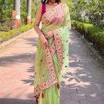 Multi Thread Work Pista Green Net Saree With Pink Blouse