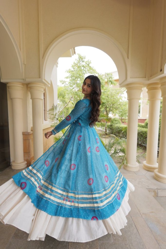 Navratri Dandiya Kutchi patchwork and a white layered frill lehenga