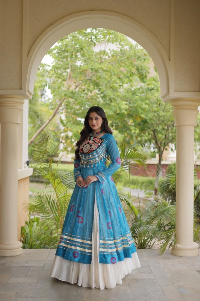 Navratri Dandiya Kutchi patchwork and a white layered frill lehenga