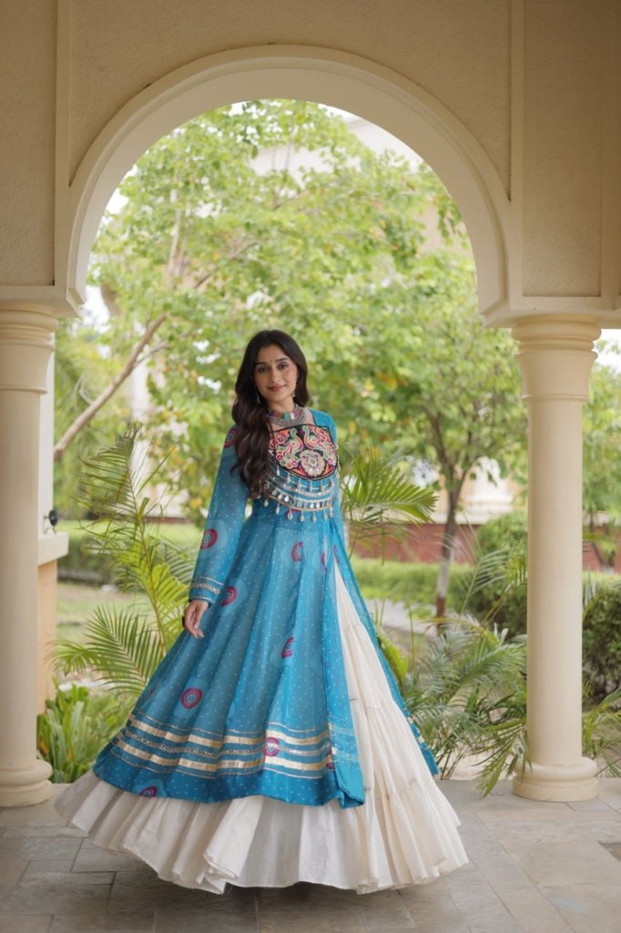 Navratri Dandiya Kutchi patchwork and a white layered frill lehenga