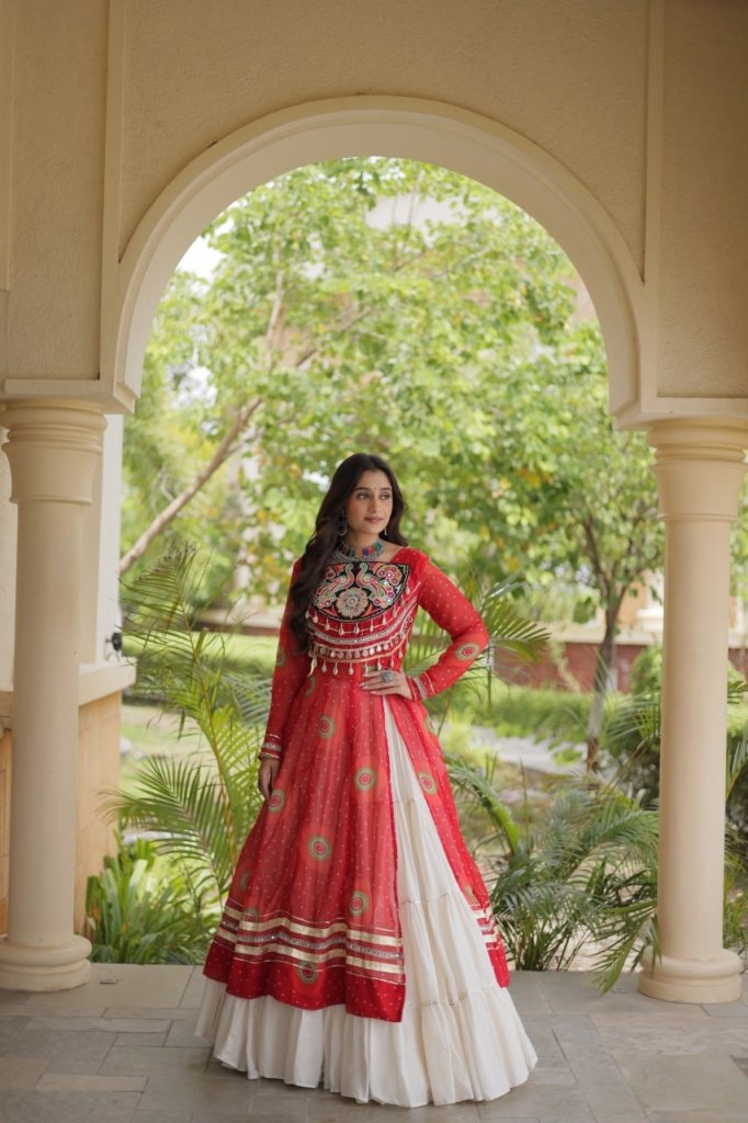 Navratri Dandiya Kutchi patchwork and a white layered frill lehenga