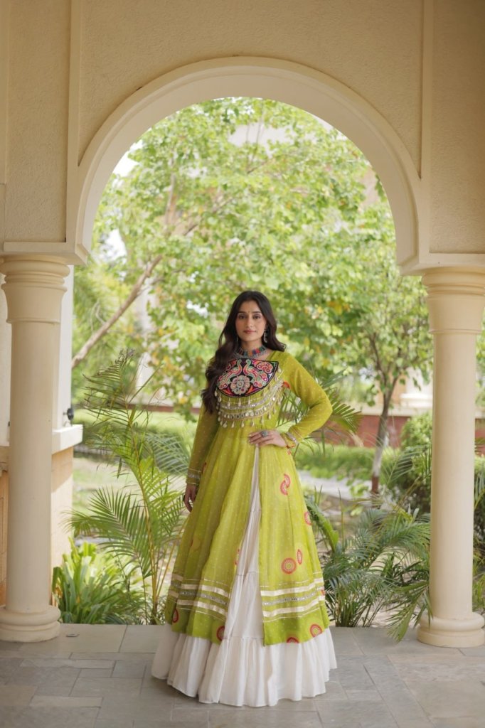 Navratri Dandiya Kutchi patchwork and a white layered frill lehenga