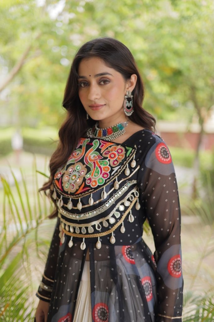 Navratri Dandiya Kutchi patchwork and a white layered frill lehenga
