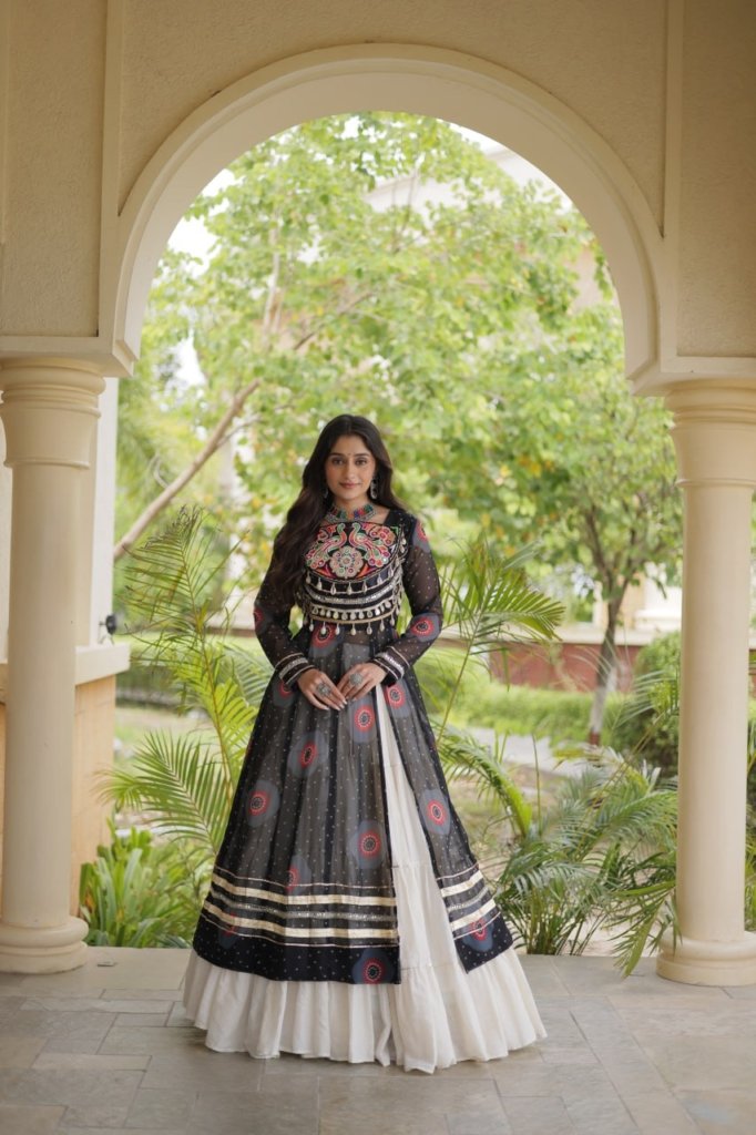 Navratri Dandiya Kutchi patchwork and a white layered frill lehenga
